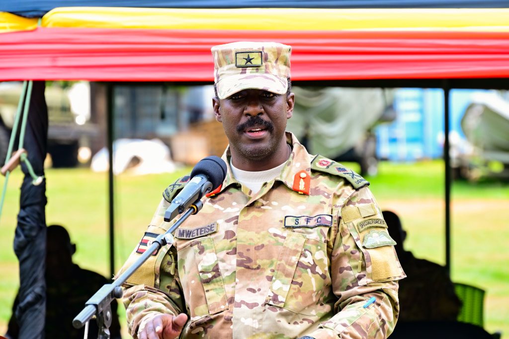 Brig General Asaf Mweteise the SFC deputy Commander addressing newly promoted SFC officers and their guests during the pipping ceremony at Entebbe on Friday PPU Photo