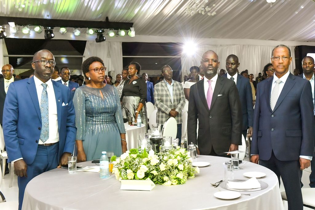 Deputy Speaker of Parliament Thomas Tayebwa, Deputy Chief Justice Richard Buteera (R, Health Minister Ruth Aceng and other guests attending Dr. Diana Atwine's 25th wedding anniversary at Serena Kigo on Saturday.