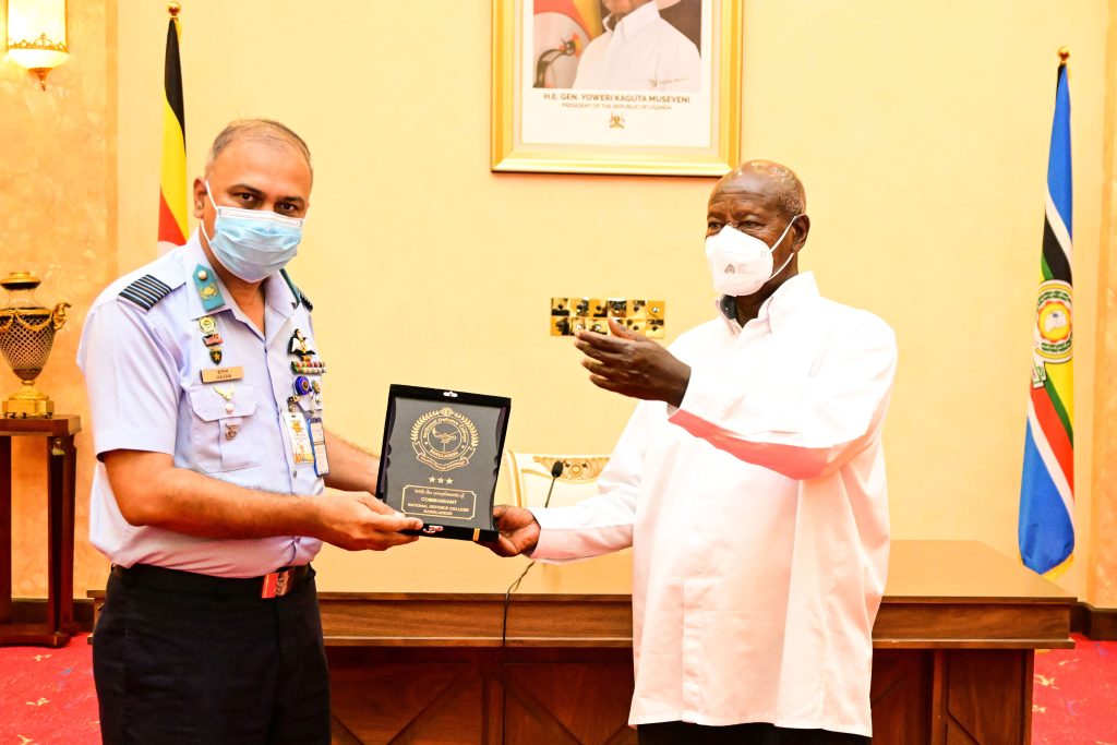 Group Captain from Bangaladesh National Defence College Hasani Mahmud presents gifts to President Museveni after an opportunity lecture at State House Entebbe on Wednesday. PPU Photo