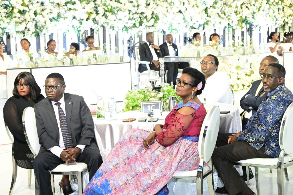 Justice Minister Nobert Mao (L), Hon Muhanga, Hon Bahati and Uganda Human Rights Commission's Crispin Kaheru (R)  attending Dr. Diana Atwine's 25th wedding anniversary at Serena Kigo on Saturday. PPU Photo