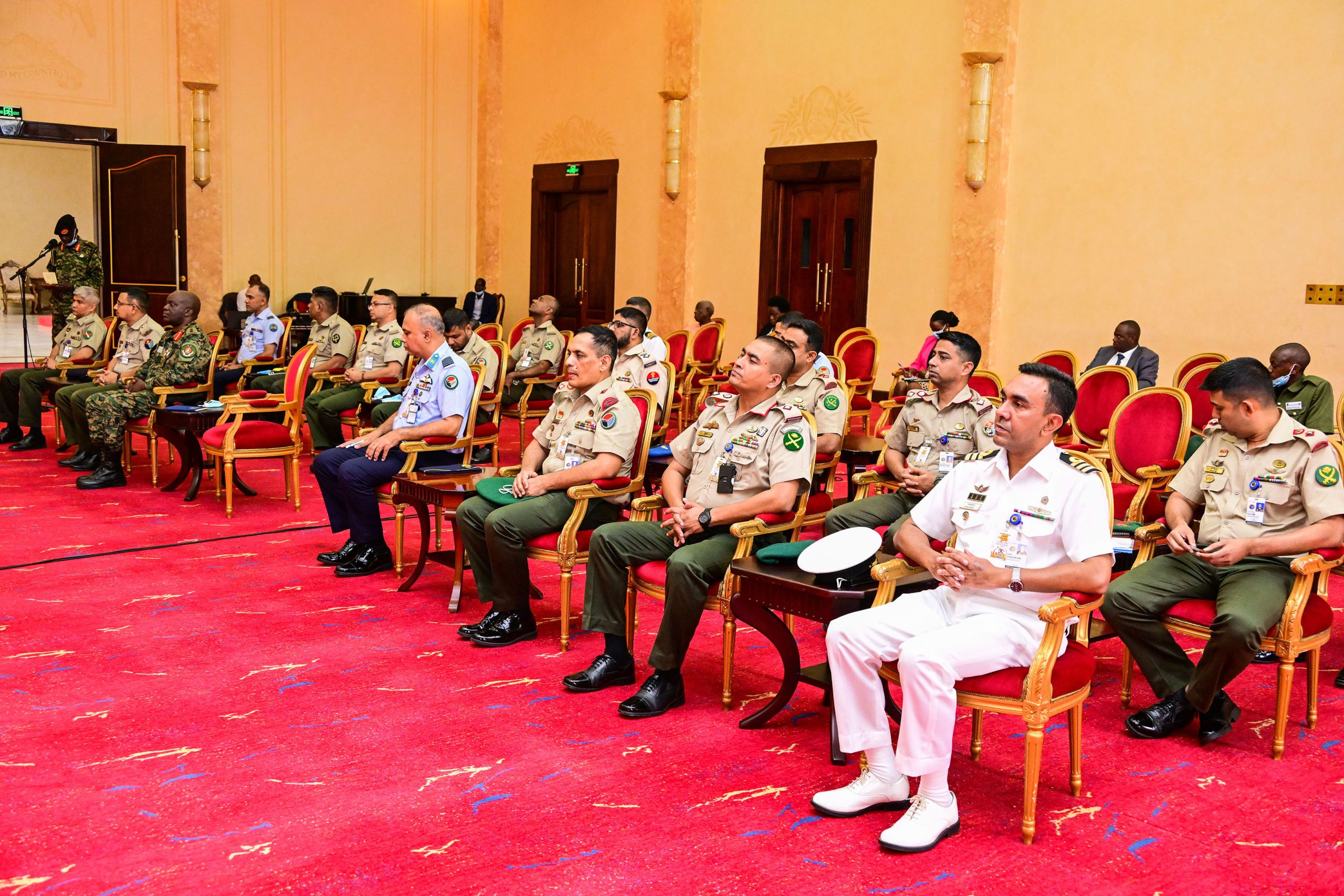 Officers from Bangaladesh National Defence College listening to President Museveni's address during an opportunity lecture at State House Entebbe on Wednesday. PPU Photo