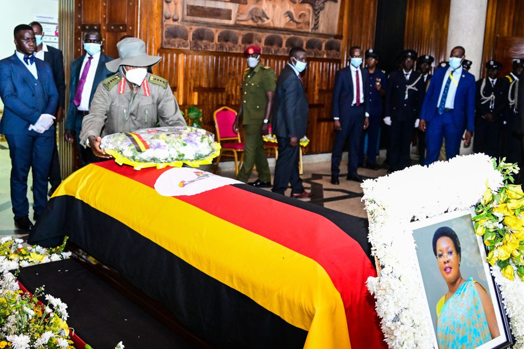 President Museveni lays a wreath on the coffin containing the remains of former Defence state minister Sarah Mateke at Parliament on Tuesday PPU Photo