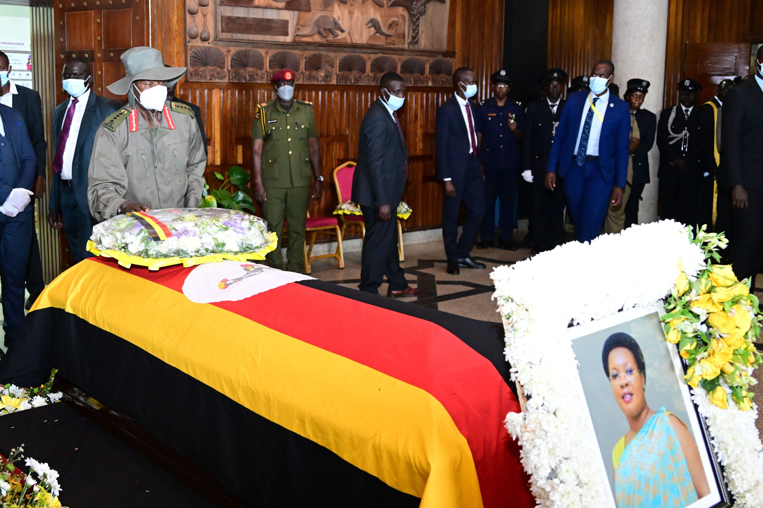 President Museveni lays a wreath on the coffin containing the remains of former Defence state minister Sarah Mateke at Parliament on Tuesday Sept 10 PPU Photo