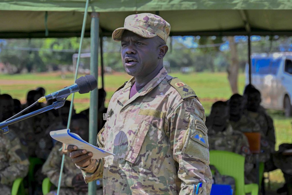 Director of Training and Doctrine – SFC Lt. Col. Paul Micki Lokut making his remarks during the Passing out of PPG Trainees at the Police Presidential Guard  Special Force Training School Fort Samora Machel in Kaweweta on the 22nd October 2024. Photo by PPU/Tony Rujuta.