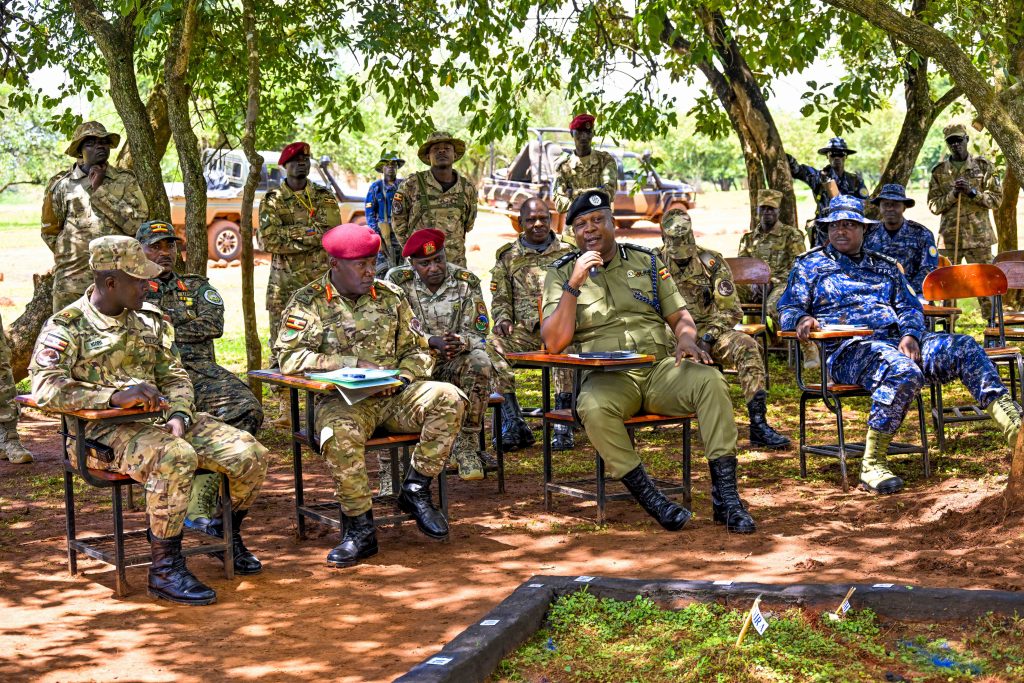 Director Human Resource and Development and Training AIGP Moses Kafeero giving some advice to the trainees in the presence of other Senior officers during the Passing out of PPG Trainees at the Police Presidential Guard  Special Force Training School Fort Samora Machel in Kaweweta on the 22nd October 2024. Photo by PPU/Tony Rujuta.