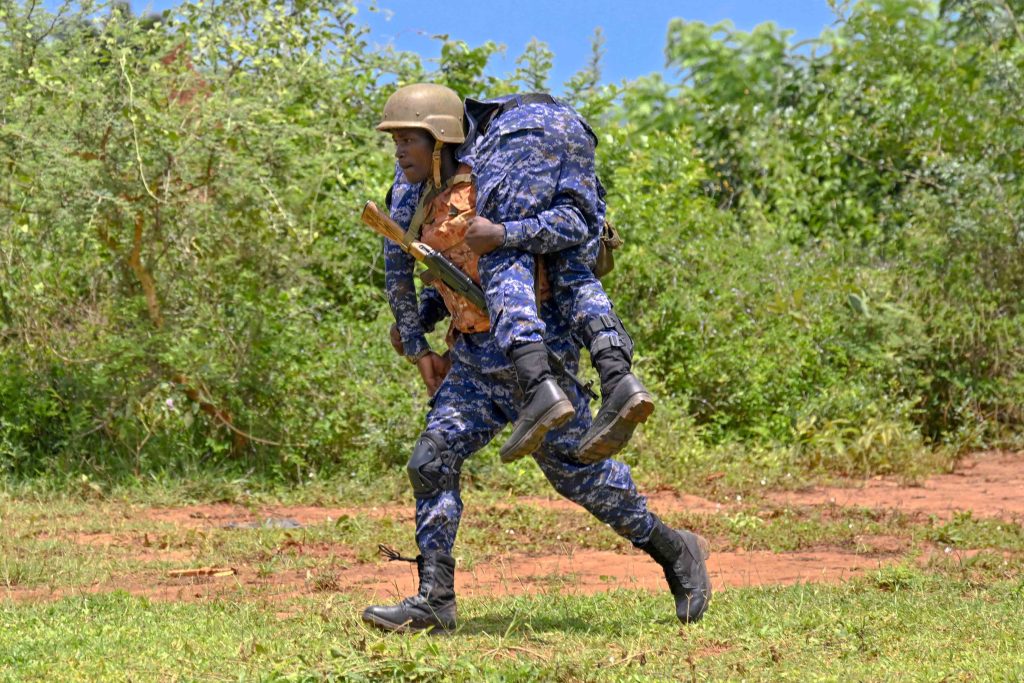 Police Presidential Guard Trainees demonstrate Range Exercise at Range ground during the Passing out of PPG Trainees at the Police Presidential Guard  Special Force Training School Fort Samora Machel in Kaweweta on the 22nd October 2024. Photo by PPU/Tony Rujuta.