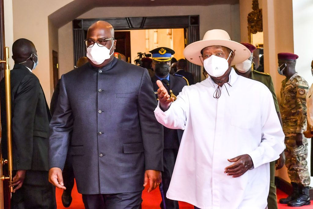 President Yoweri Museveni chats wiith President Felix Tshisekedi of DR Congo shortly after receiving him at State House Entebbe on Wednesday. The DRC president is in Uganda on a one day working visit. PPU Photo