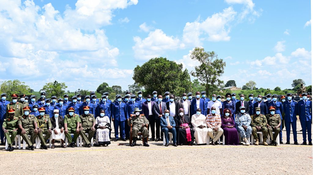 President Museveni seated C and other senior UPDF officers pose for a photo with some of the officer cadets during their passout at the Uganda Military Academy in Kabamba on Tuesday PPU Photo