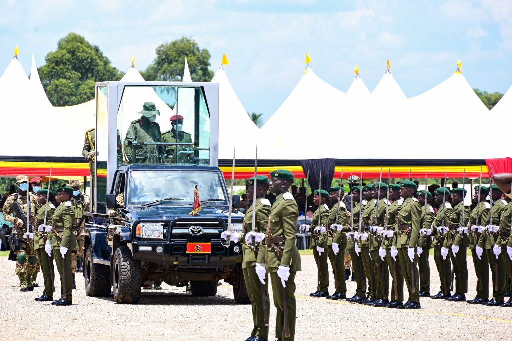 President Museveni watches a military parade by cadet officers during their passout at the Uganda Military Academy in Kabamba on Tuesday PPU Photo