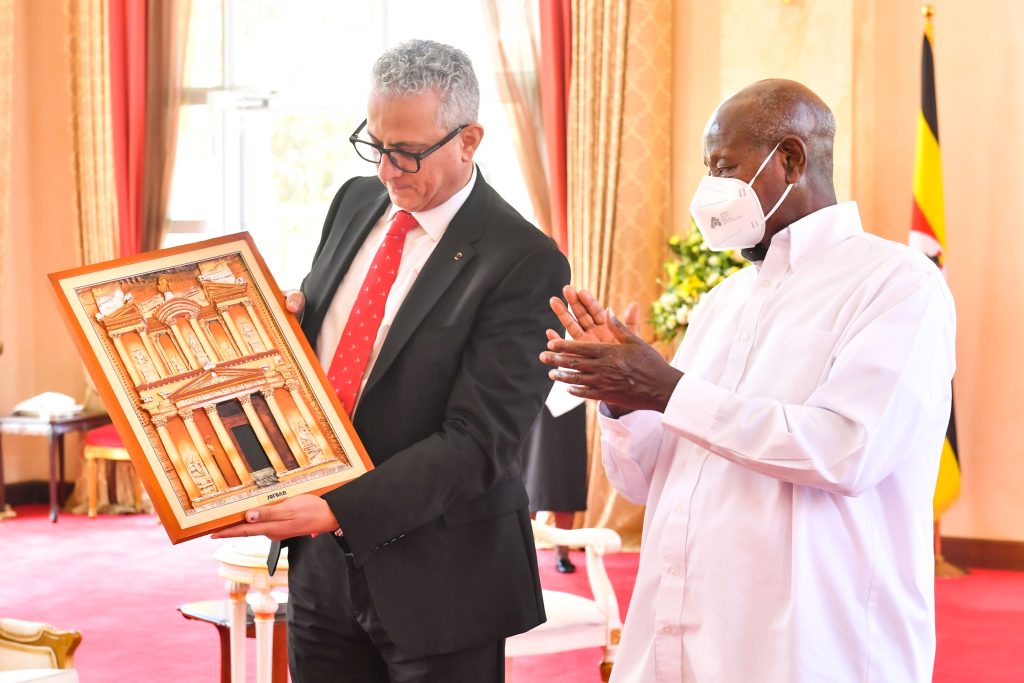 Jordan's new ambassador to Uganda Firas Khouri presents a gift to President Museveni shortly after presenting his credentials at State House Entebbe on Thursday PPU Photo