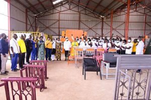 President Museveni accompanied by VP Alupo, Speaker Among and SHC Jane Barekye inspects hair dressing students as their display their skills at the Teso Industrial hub during its commissioning on Tuesday - PPU Photo