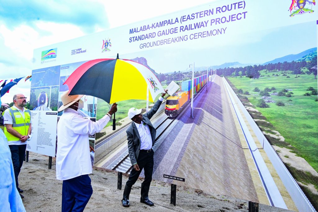 President Museveni is shown an artistic impression Malaba Kampala SGR railway line during the laying of the foundation in Tororo on Thursday PPU Photo