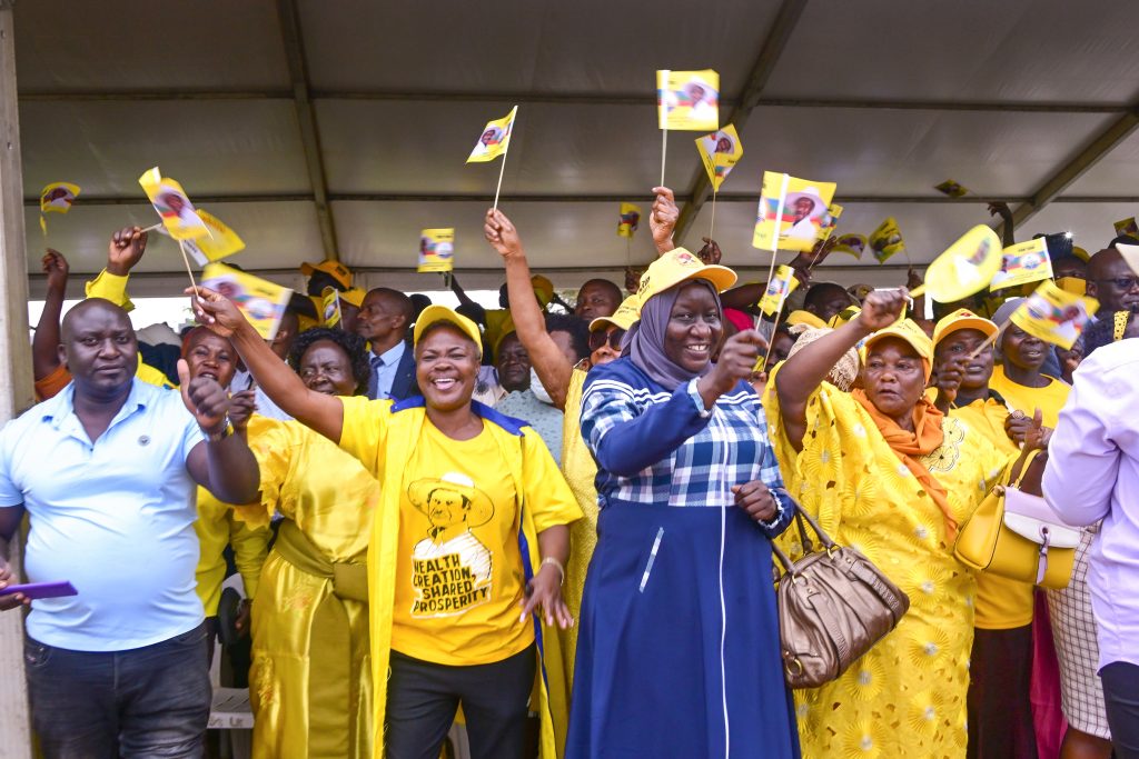 Members of the yellow girls in Mbale City express their excitment as they listened to President Musevenis PDM address at Maluku grouds in Mbale City on Thursday PPU Photo