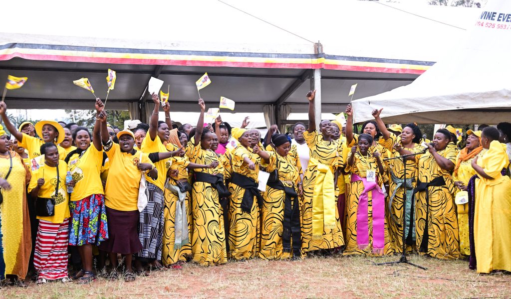 Members of the yellow girls in Mbale City express their excitment as they welcomed to President Museveni for a PDM rally at Maluku grouds in Mbale City on Thursday PPU Photo