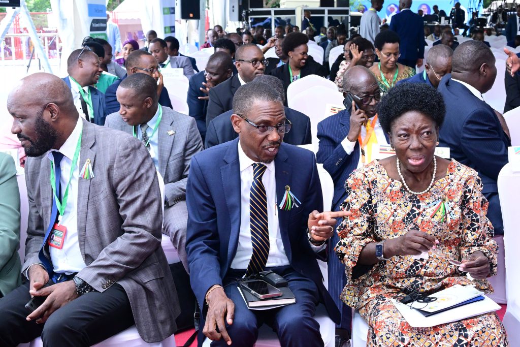 Ministers Rebecca Kadaga and Kiryowa Kiwanuka attending the EAC summit in Arusha on Friday PPU Photo