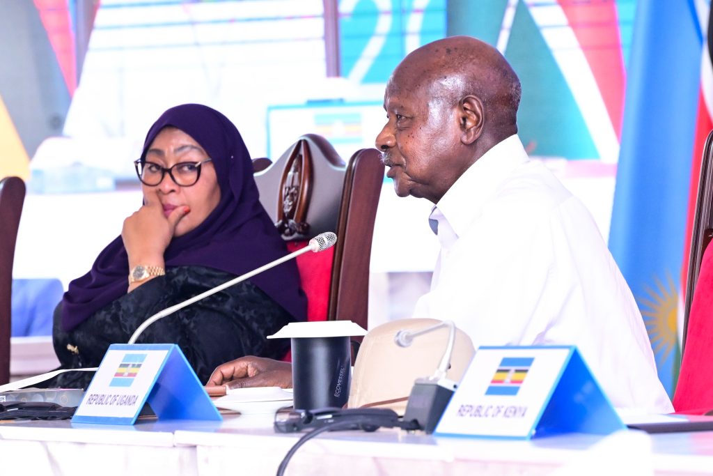 President Museveni addresses a High Level side event to commemorate the 25th anniversary of the East African Community EAC in Arusha on Friday as Tanzania President Samia Suluhu looks on PPU Photo