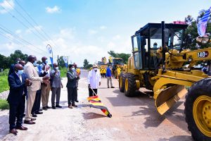 President Museveni flags off the rehabilitation of Kikorongo-Bwera-Mpondwe road in Kasese district on Saturday. Looking on are Dott Services officials and political leaders including Gen Wilson Mbadi. PPU Photo