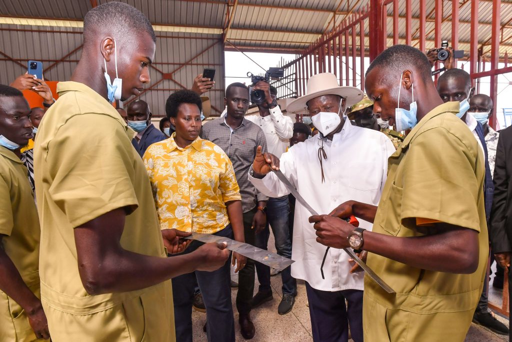 President Museveni inspects some of the metal products being made by the welding students at the Bugisu Industrial Hub in Lukhonge Mbale district on Wednesday shortly after commissioning the skilling facility. PPU Photo