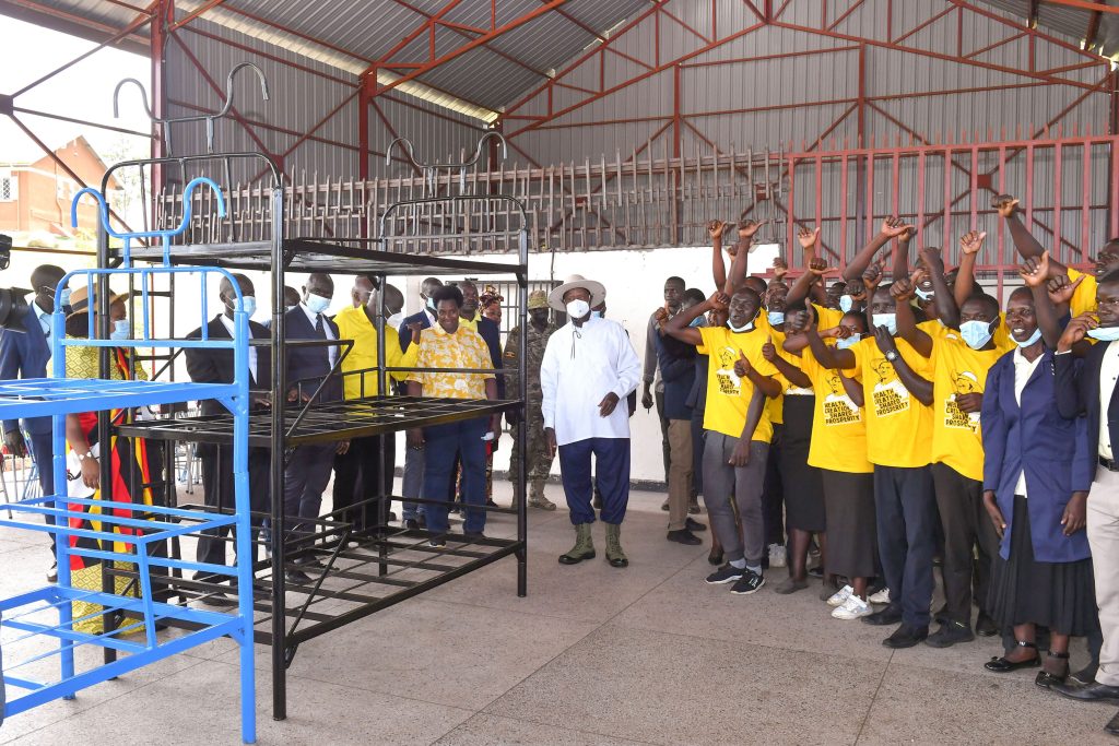 President Museveni inspects some of the metal products being made by the welding students at the Bugisu Industrial Hub in Lukhonge Mbale district on Wednesday shortly after commissioning the skilling facility. 