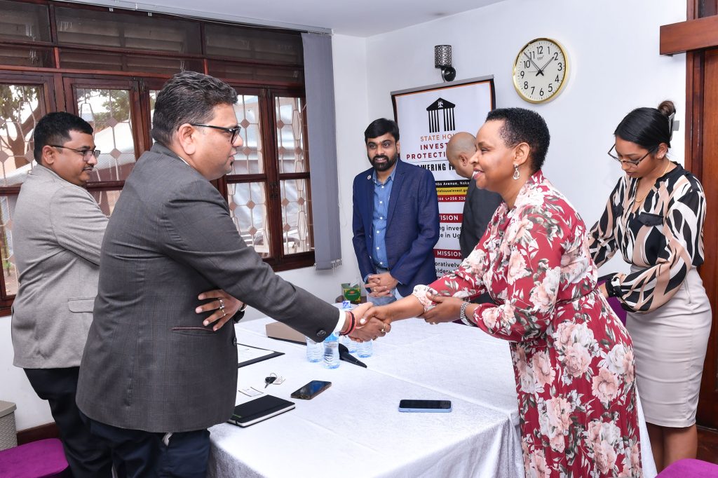 Col Edith Nakalema shares a light moment with the director general of the Indian Business Forum Rajesh Kumar and his delegation during a meeting at Nakasero on Monday PPU Photo