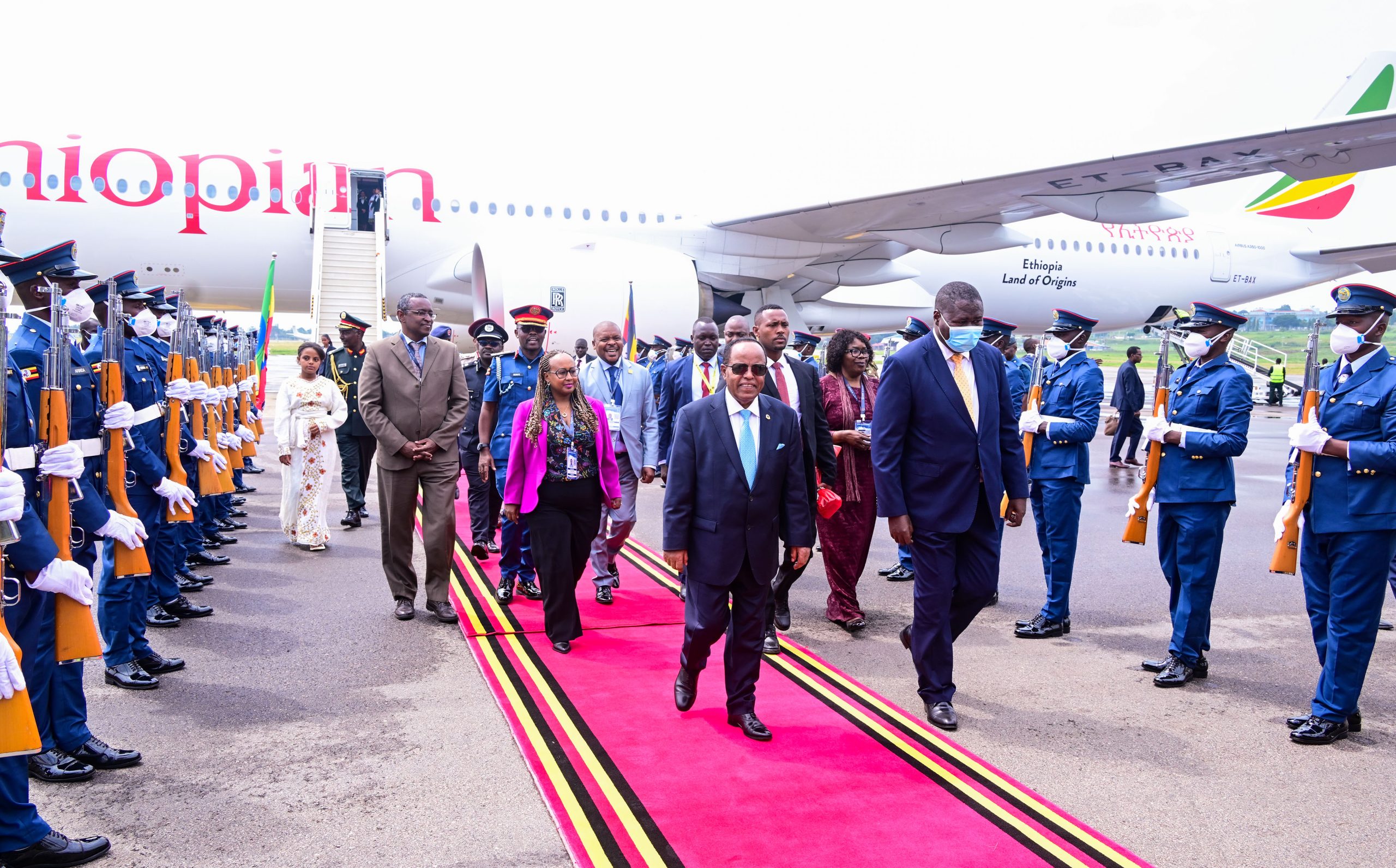 Ethiopias President Taye Atske Selassie L arrives at Entebbe Airport for the AU Summit He was received by Hon Jacob Oboth R and several foreign affairs officers PPU Photo