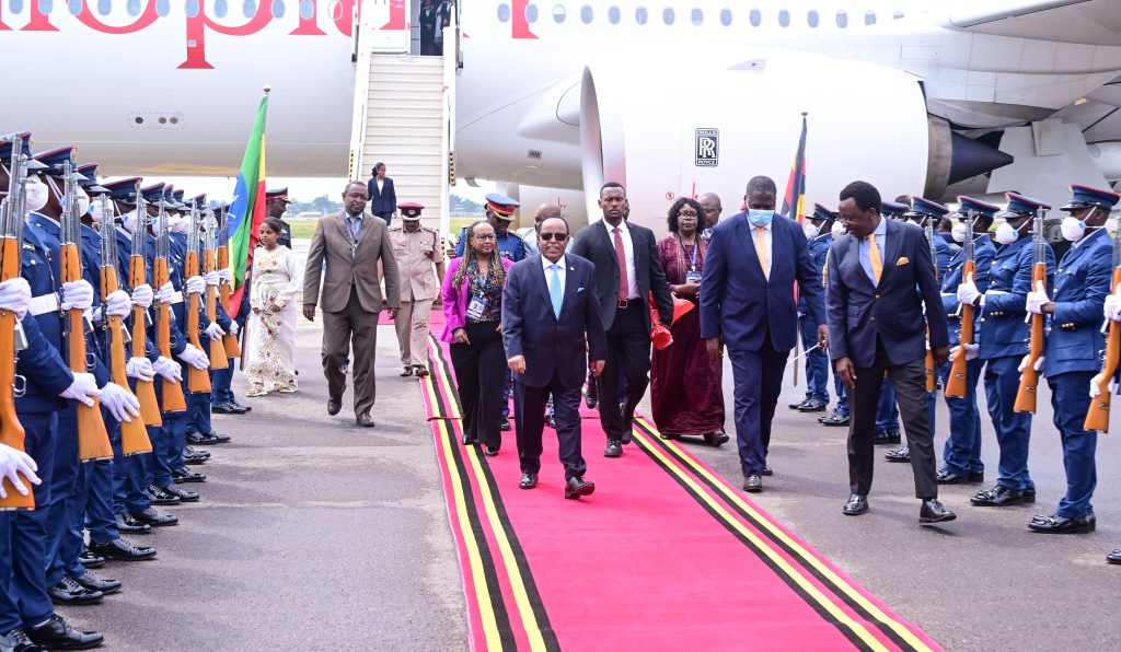 Ethiopia's President Taye Atske Selassie (L) arrives at Entebbe Airport for the AU Summit. He was received by Hon Jacob Oboth (R) and several foreign affairs officers. PPU Photo