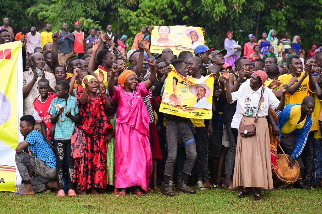 Residents of Nawampiti in Luuka district express their excitment as they welcomed President Museveni to a passion passion fruit farmer Eliot Mukasas home in Nawampiti on Wednesday PPU Photo