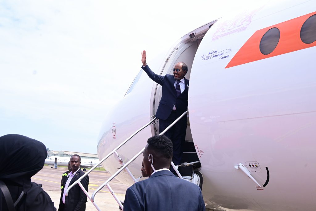 Somalia's President Hassan Sheikh Mohamud departs Entebbe airport after attending AU summit in Kampala PPU Photo