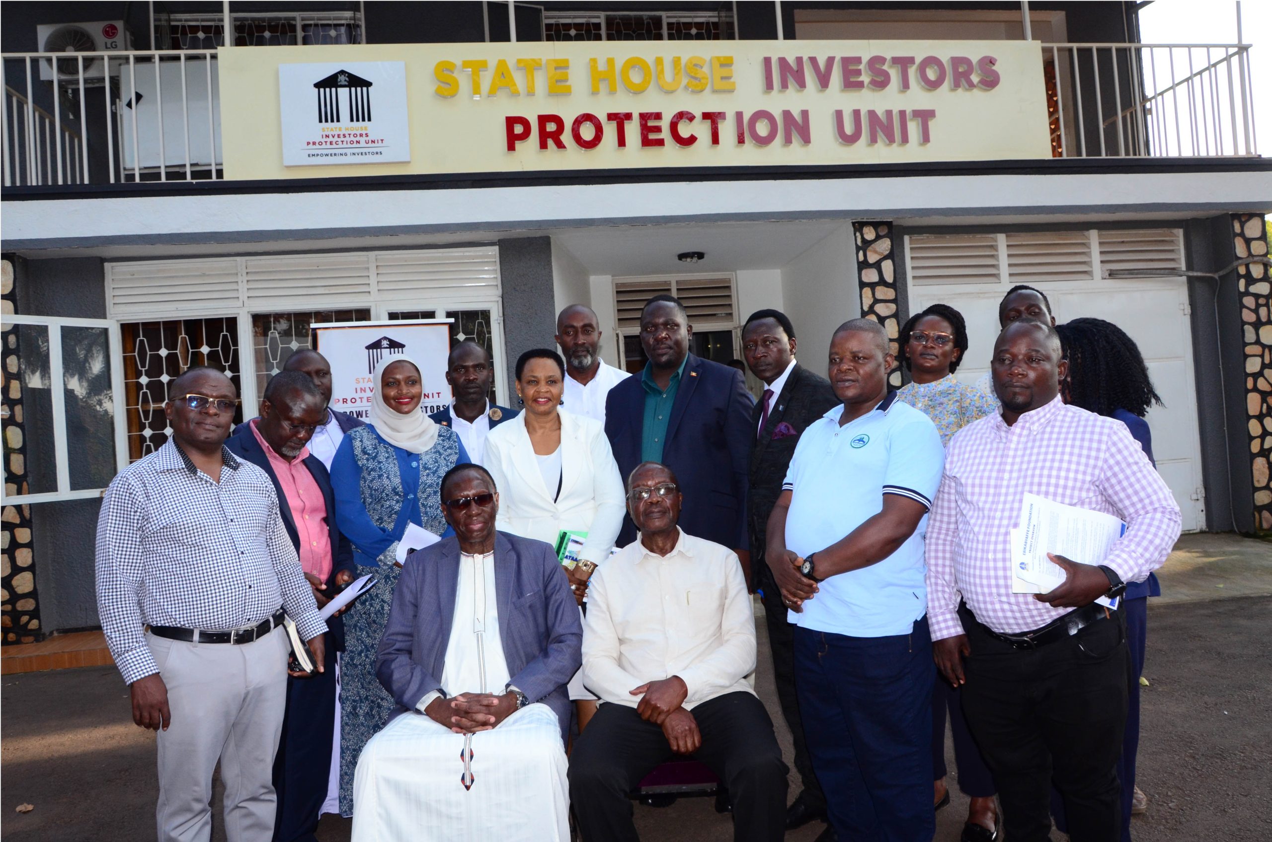 Members of Ebikabyaffe Foundation taking a group picture with Col. Edith Nakalema, Head of State House Investors Protection Unit (Centre) at SHIPU offices in Kampala. PHOTO BY COLLEB MUGUME