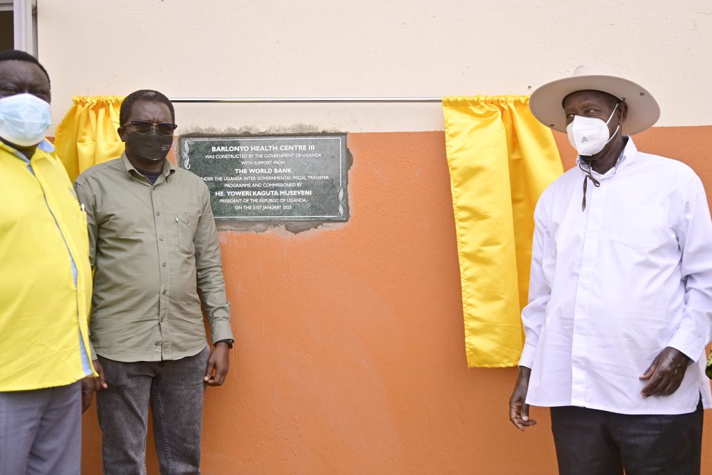 Laying a wreath at the Memorial site of 302 LRA victims in Erute South - Lira District