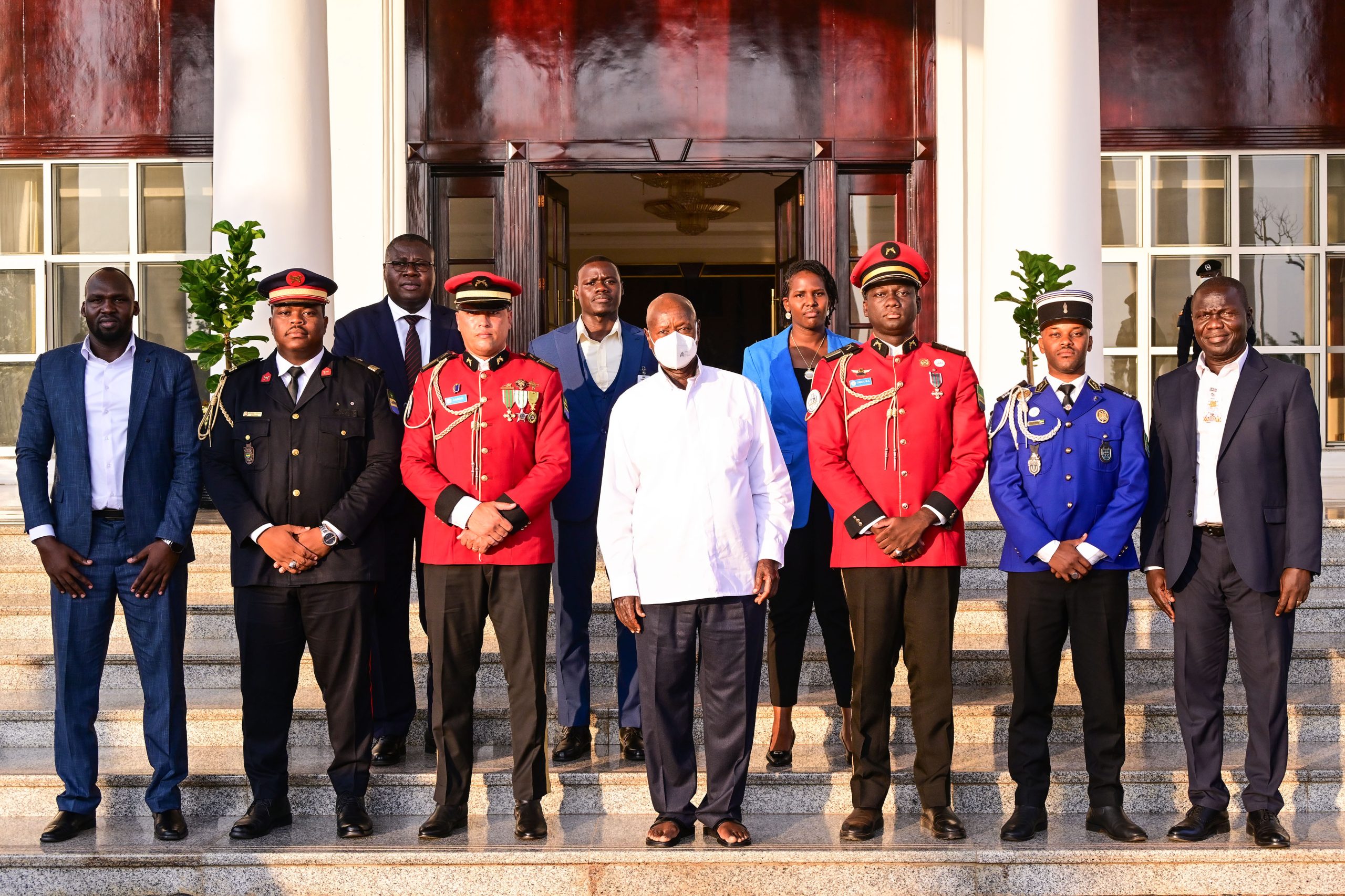 President Museveni poses for a photo with Gabon army officers who have just concluded studies at the Junior Staff College in Jinja. This was after a meeting at Entebbe on Monday