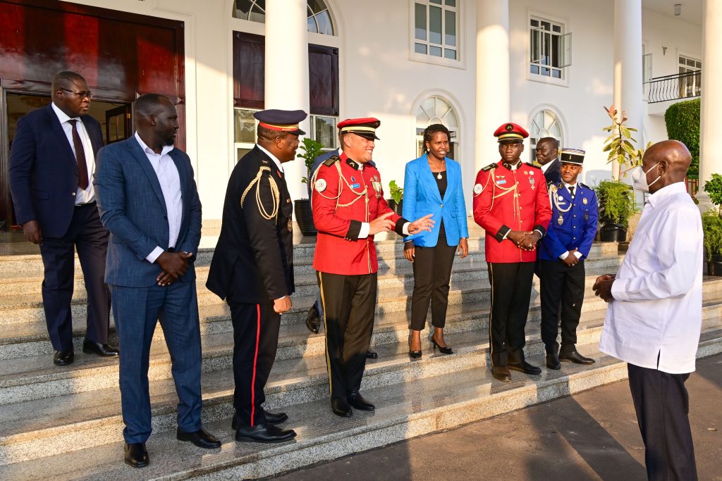 President Museveni talks to Gabon army officers who have just concluded studies at the junior Staff College in Jinja Standing C is Major Desire Muhooza the team leader PPU Photo