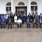 President Yoweri Kaguta Museveni in a group photo with the 21 newly Sworn in Acting Judges of the High Court (standing) at the State House Entebbe on the 4th March 2025. Photo by PPU/ Tony Rujuta.