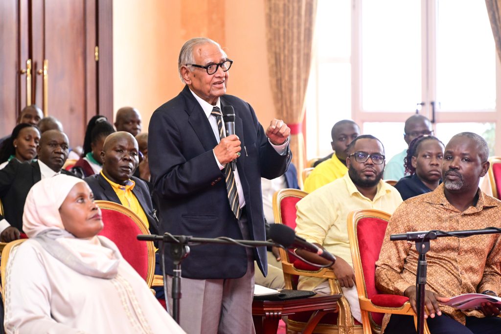 One of the sugar millers making a contribution during a meeting with President Museveni at as Deputy Speaker Thomas Tayebwa R and Hon Nakadama L look on PPU Photo - State House Uganda President Museveni signs the Sugar Ammendment Act 2025 into law during a meeting with sugar cane growers and miller at State House Entebbe on 30th May 2025. PPU Photo