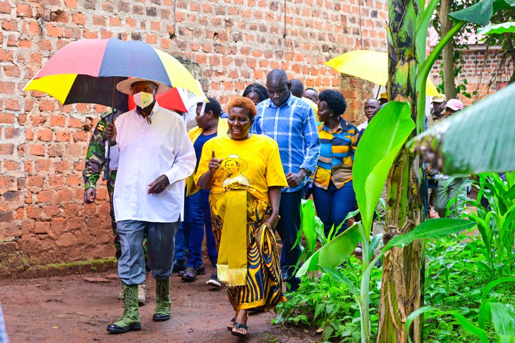 PDM beneficiary Damali Nakayenga L shows President Museveni part of her piggery project at her home in Kikoma Wobulenzi town on Tuesday PPU Photo - 20-May-2025 - State House Uganda PDM beneficiary Damali Nakayenga L shows President Museveni part of her piggery project at her home in Kikoma Wobulenzi town on Tuesday PPU Photo - 20-May-2025