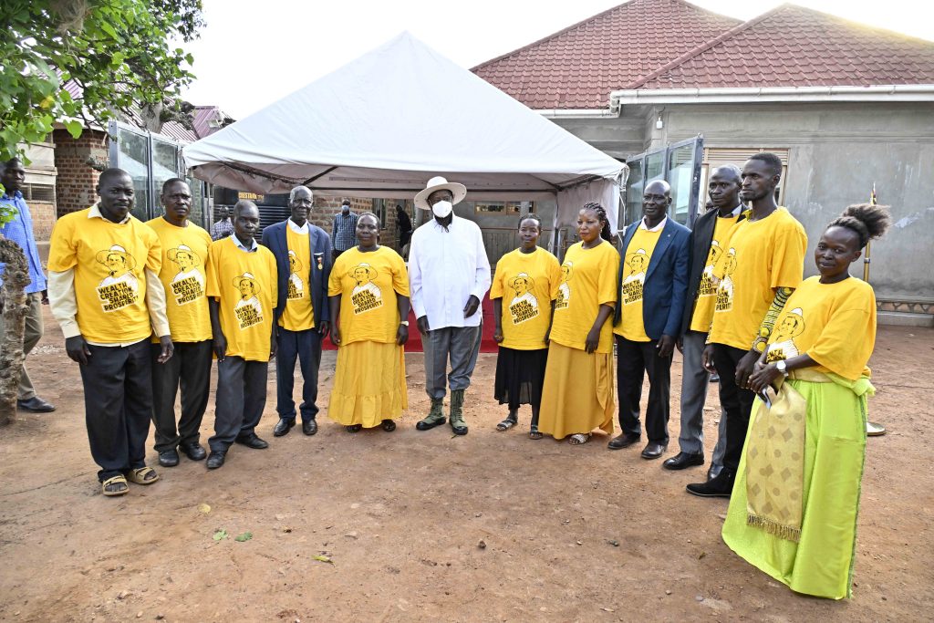 PDM beneficiary Damali Nakayenga L shows President Museveni part of her piggery project at her home in Kikoma Wobulenzi town on Tuesday PPU Photo - 20-May-2025 - State House Uganda PDM beneficiary Damali Nakayenga L shows President Museveni part of her piggery project at her home in Kikoma Wobulenzi town on Tuesday PPU Photo - 20-May-2025