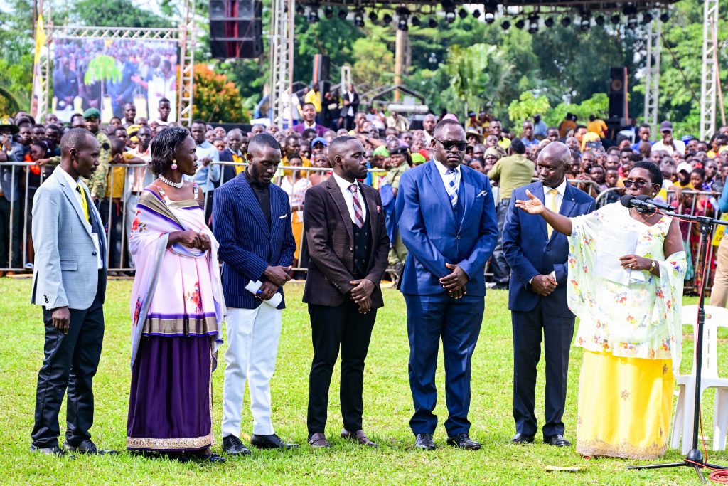State Minister for Public Service Grace Mugasa R introduces members of her family during her thanksgiving ceremony in Kikube district on Friday PPU Photo - State House Uganda President Museveni At A Thanksgiving Ceremony For Hon. Grace Mary Mugasa, The Minister Of State For Public Service, Held At Kisaaru-Kyabayanja Village, Kimbugu Parish In Kabwoya Sub-County, Kikuube District – 24-May-2025