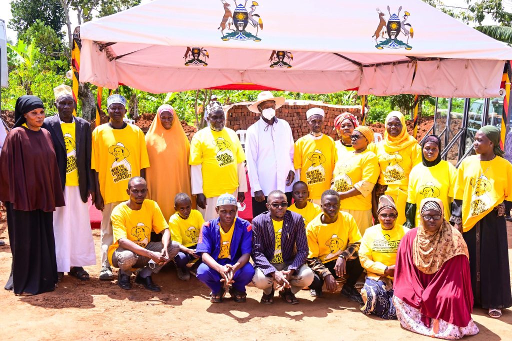President Museveni poses for a photo with Haji Zziwa and his family during his PDM assessment in Kamengo, Mpigi on Monday shortly after touring Zziwa's poultry, cattle farms, coffee and banana plantations. - State House Uganda President Museveni poses for a photo with Haji Zziwa and his family during his PDM assessment in Kamengo, Mpigi on Monday shortly after touring Zziwa's poultry, cattle farms, coffee and banana plantations.