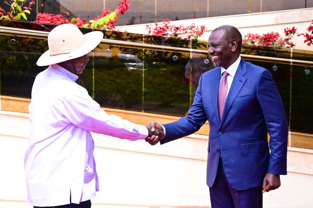 President Museveni shares a light moment with President William Ruto of Kenya on his arrival at State House Kenya on Wednesday July 30th 2025. President Museveni is in Kenya on a two day official visit. PPU Photo