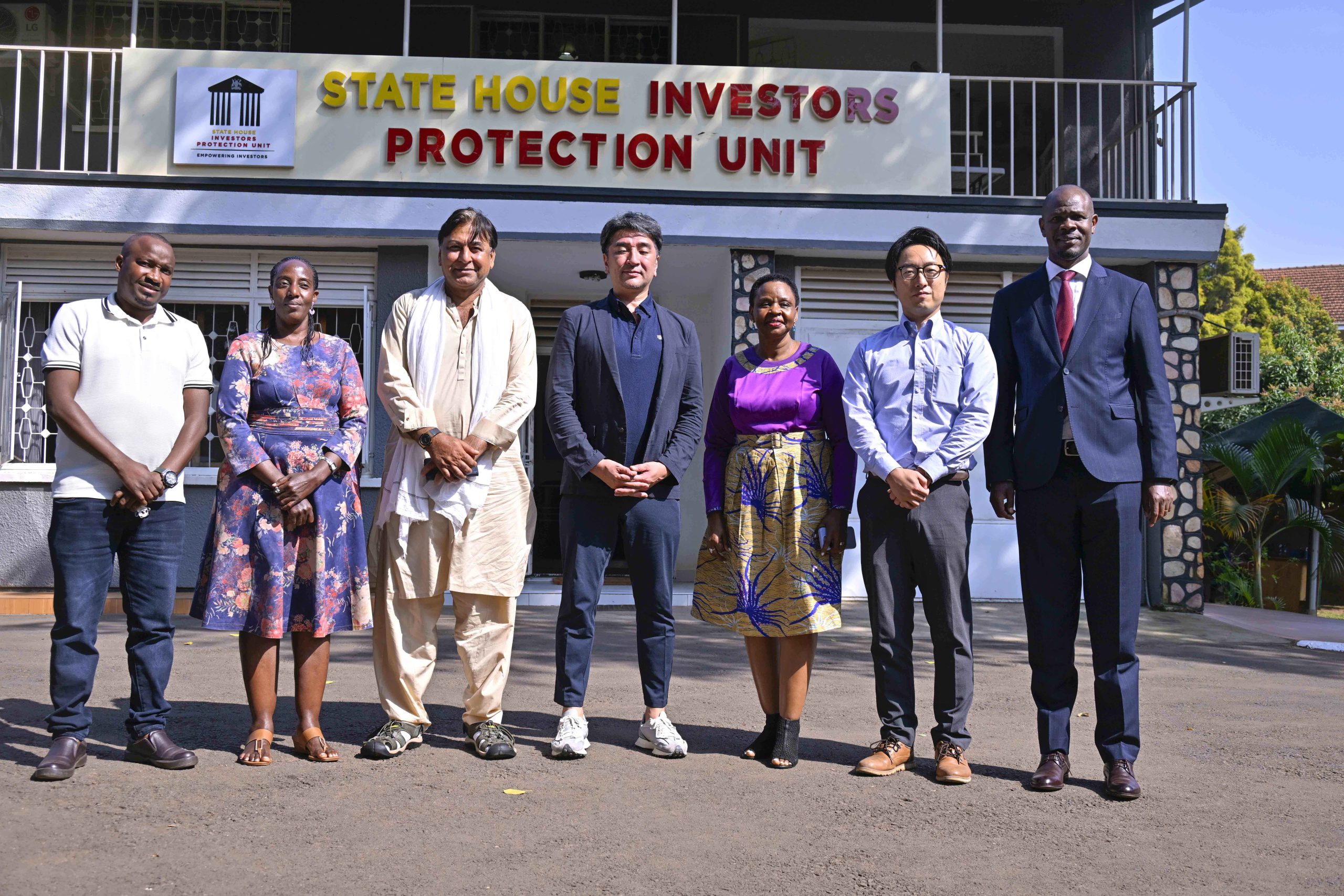 State House Investors Protection Unit (SHIPU) head Col. Edith Nakalema (third right) in a group photo with Yoshino Trading Ltd CEO Shamsake Nakamishi (fourth right), Yoshino Trading Ltd Director Kotaro Kake (second right), Yoshino Trading Ltd MD Ali Abas (third left), the National Forest Authority Executive Director Stuart Maniraguha, the National Forest Authority (NFA) Executive Director Stuart Maniraguha (right) and NFA personal Assistant Hope Kyampaire (second left) after a meeting at SHIPU officers in Kampala on the 30th July 2025. Photos by PPU/Tony Rujuta.