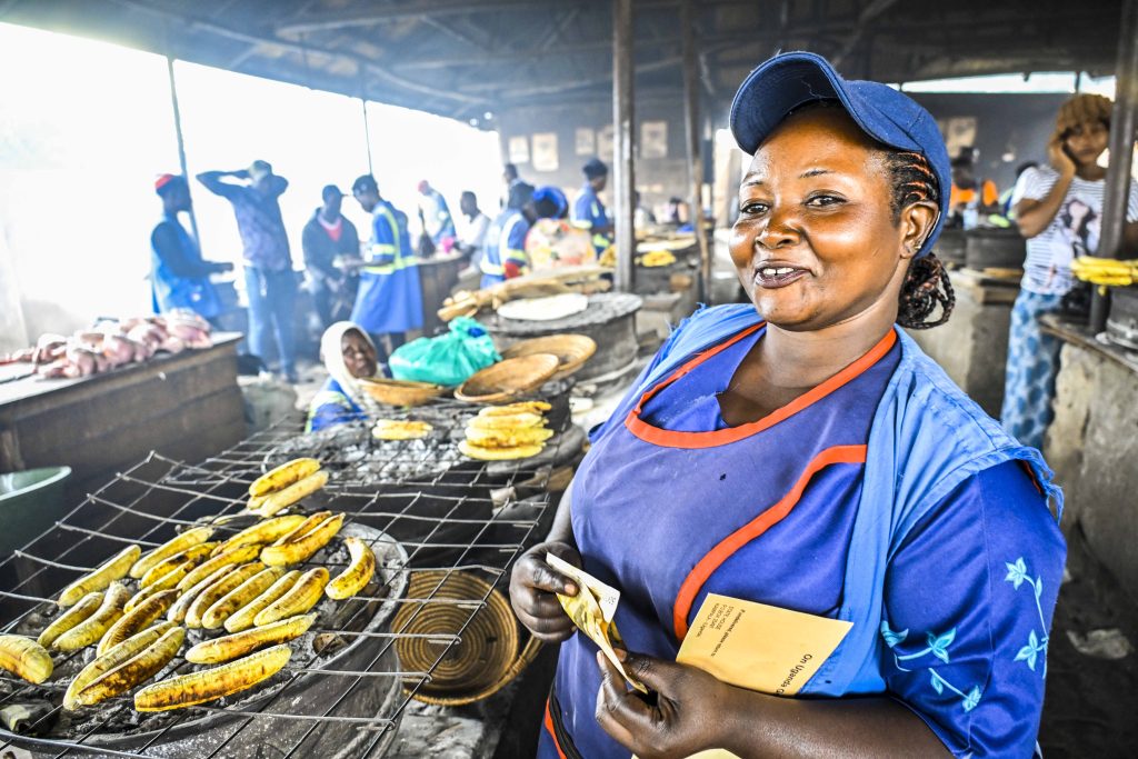 Nassuna Jane shows off some of the roosted Gonja and she’s going to boost her business after receiving President Yoweri Kaguta Museveni’s financial support at Lukaya Road Toll market in Lukaya Town in Kulungu district on the 12th August 2025. Photo by PPU/Tony Rujuta.