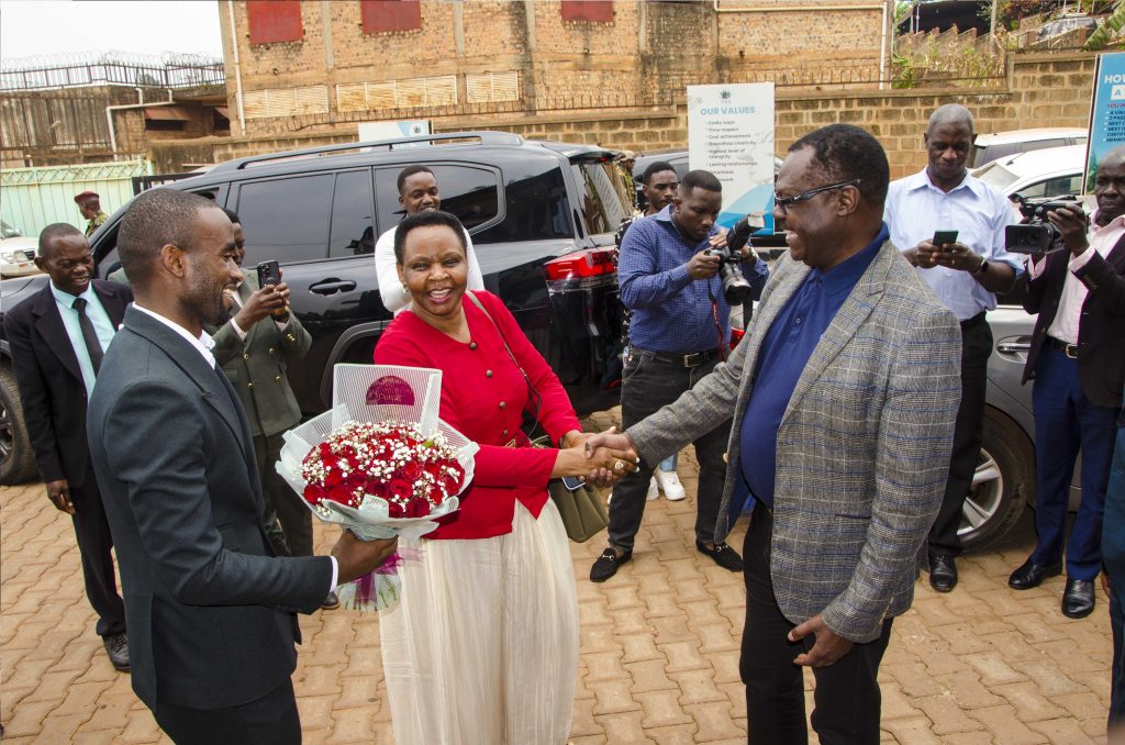 Col. Edith Nakalema, Head of State House Investors Protection Unit (Centre), Patrick Ayota, Managing Director NSSF (Right) and Obed Ben Rukuringamamanzi, founder Youth Platform Africa (Left) interact. PPU PHOTO.