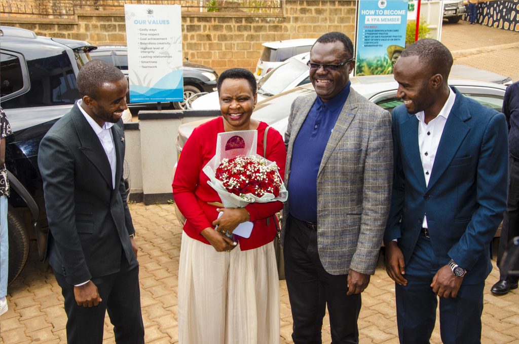 Col. Edith Nakalema, Head of State House Investors Protection Unit (Second Left), Patrick Ayota, Managing Director NSSF (Right) and Obed Ben Rukuringamamanzi, founder Youth Platform Africa (Left) interact. PPU PHOTO.