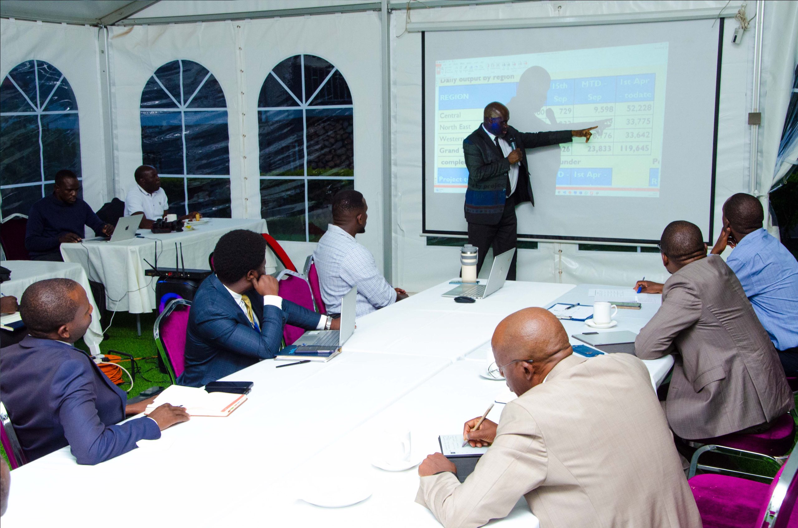 Paul Mwesigwa, Managing Director Uganda Electricity Distribution Company Limited (UEDCL) (standing) gives his presentation during the meeting held at State House Investors Protection Unit Offices on Tuesday 16 September 2025. PPU PHOTO.
