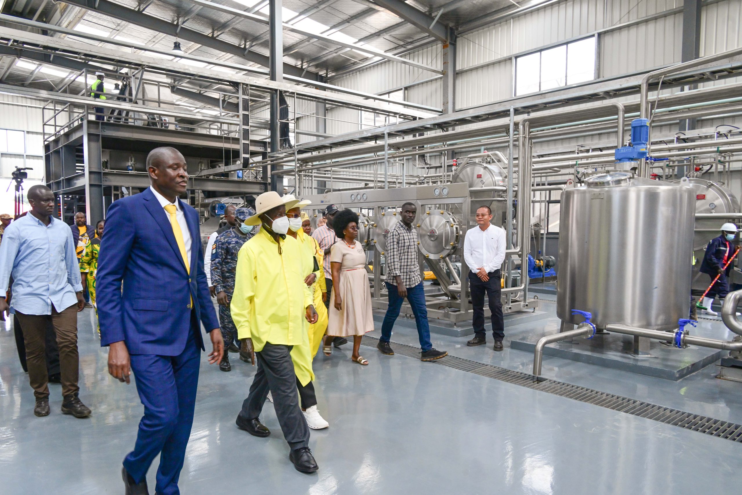 Dr. Mathias Magoola (L), founder of Dei BioPharma taking President Museveni and First Lady Janet on a guided tour of the starch manufacturing plant at Namasagali - 20-Nov-2025