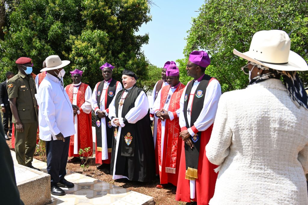 President Museveni and First Lady Janet Museveni interacting with Bishops during Archbishop Janani Luwumu Day in Mucwuni Kitgum on Monday. PPU Photo