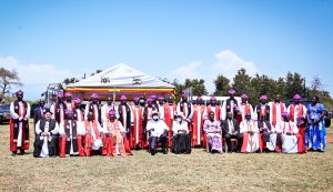 President Museveni and First Lady Janet Museveni pose for a photo with Anglican Bishops during Archbishop Janani Luwumu Day in Mucwuni, Kitgum on Monday. PPU Photo