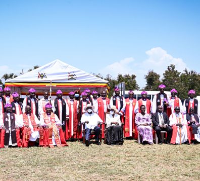 President Museveni and First Lady Janet Museveni pose for a photo with Anglican Bishops during Archbishop Janani Luwumu Day in Mucwuni, Kitgum on Monday. PPU Photo