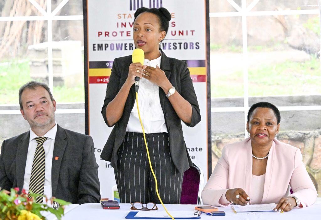 Uganda Tourism Board (UTB) Chief Executive Officer Julian Kaggwa (center) delivers her remarks in the presence of the Danish Agriculture and Food council Copenhagen Chief Executive Officer Jeppe Sondergaard Pedersen (left) and The State House Investors Protection Unit (SHIPU) head Col. Edith Nakalema (right) in a meeting that was chaired by the SHIPU Head involving the Danish Business Delegation and Government of Ugandan parastatals at the SHIPU headquarters in Kampala on 21st April 2026. Photo by PPU/Tony Rujuta.