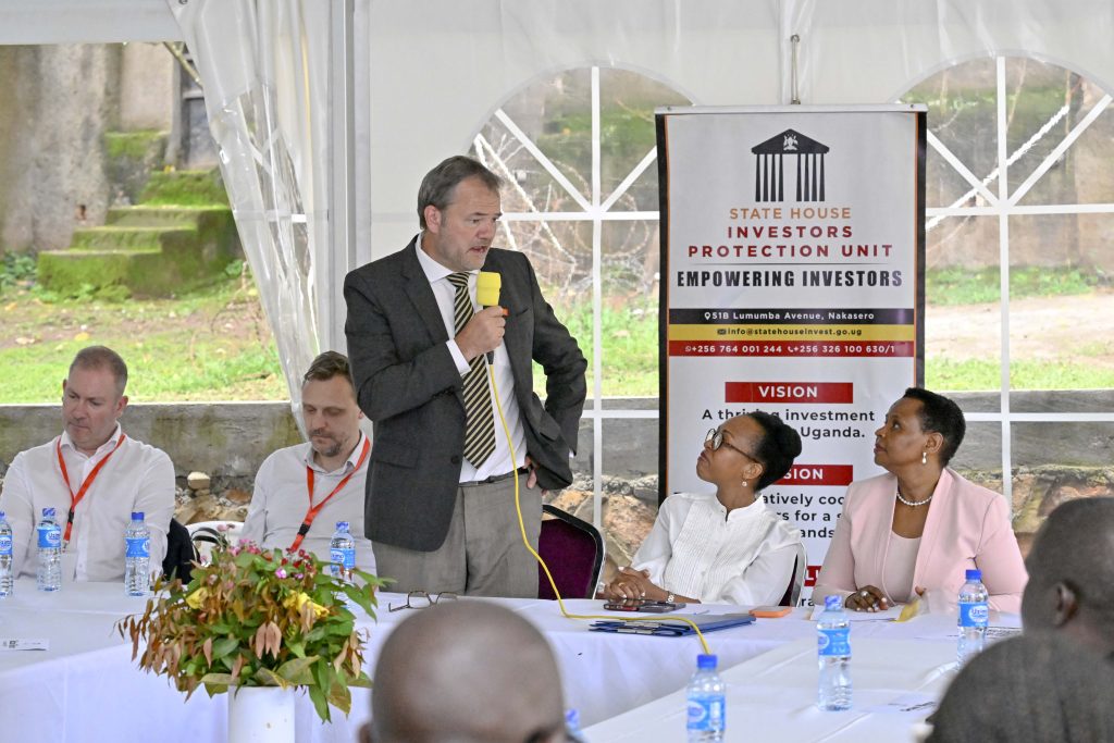 Jacob Kahl Jespsen Team Leader, Green Economy, Trade and Climate (center) delivering his message during a meeting chaired by The State House Investors Protection Unit (SHIPU) head Col. Edith Nakalema that involved the Danish Business Delegation and Government of Ugandan parastatals representatives during a business meeting at the SHIPU headquarters in Kampala on 21st April 2026. Photo by PPU/Tony Rujuta.